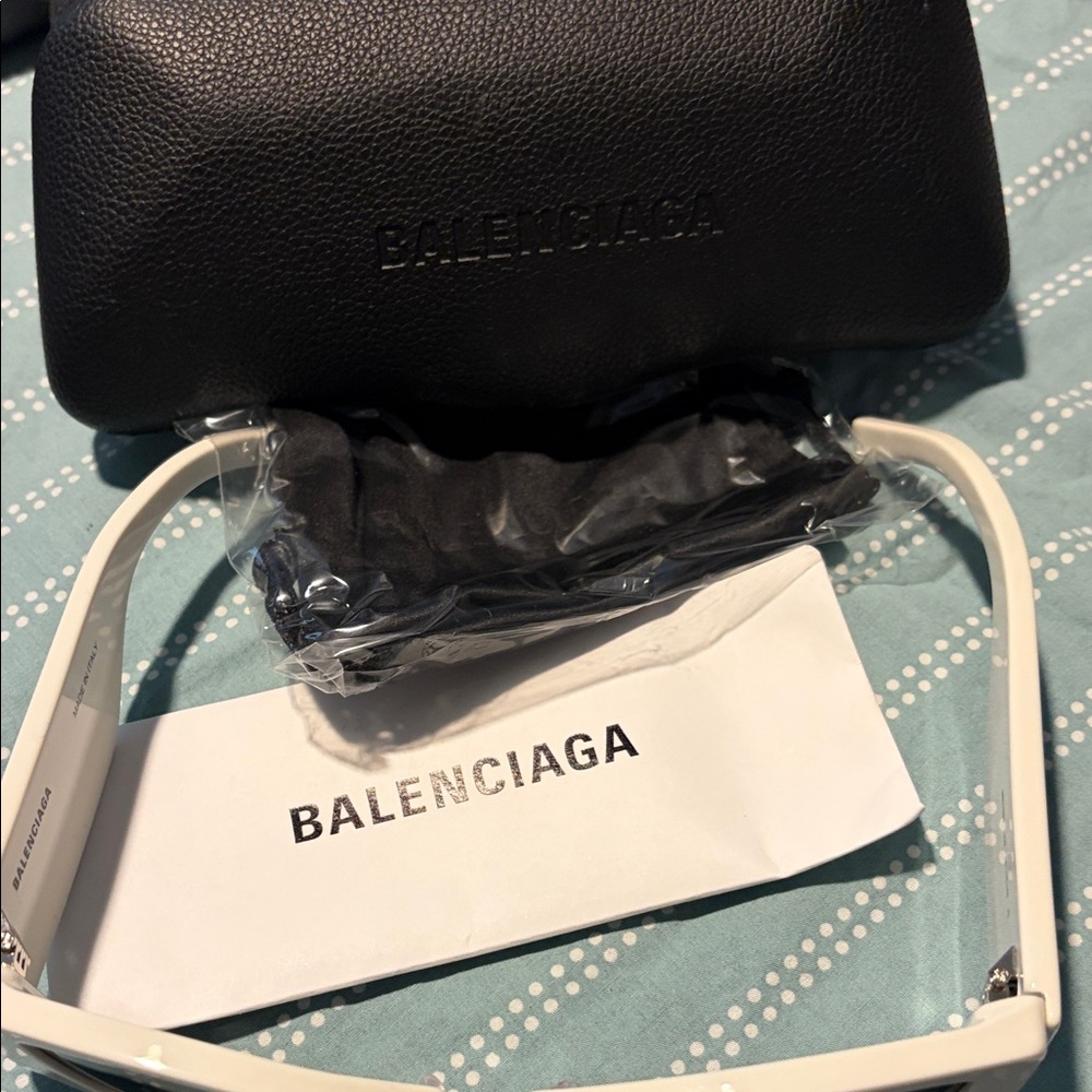 Balenciaga Black Pebbled Leather Clutch with White Strap Detail